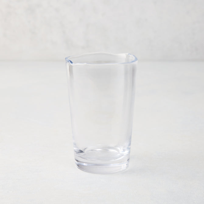 Clear Jacob Scissor-Cut Glass Tumbler, 8 oz., with a unique rippled rim.