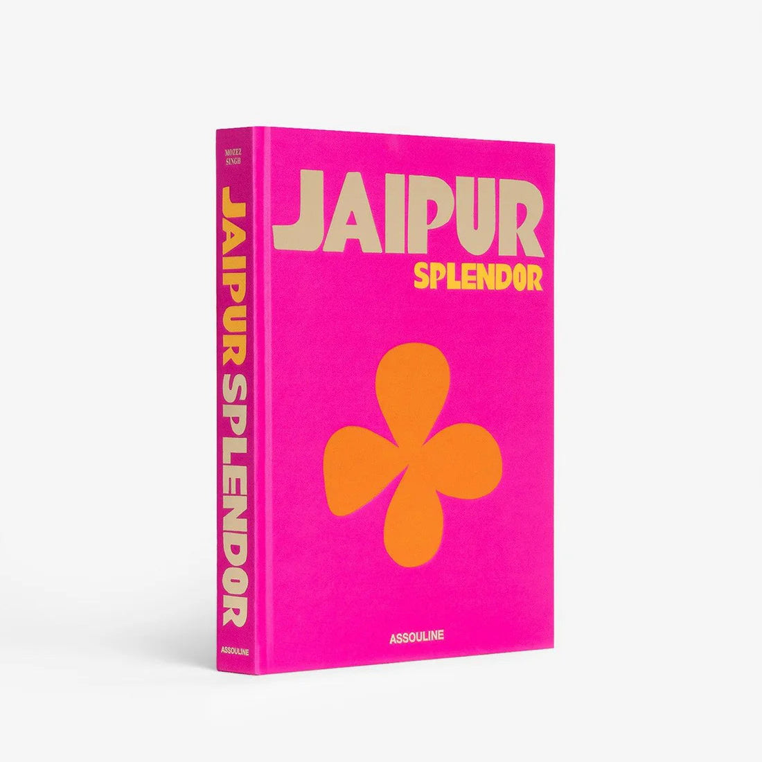 Hardcover book "Jaipur Splendor" with a vibrant hot pink cover, bold yellow title, and orange floral design.