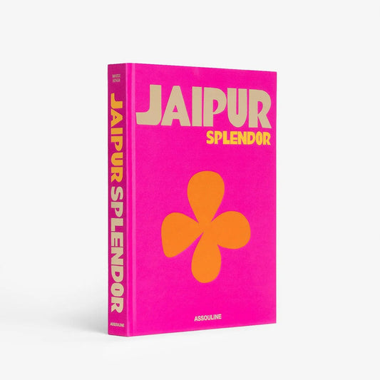 Hardcover book "Jaipur Splendor" with a vibrant hot pink cover, bold yellow title, and orange floral design.