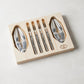 Jean Dubost Laguiole 6-piece stainless steel seafood set in a wooden box, with 4 forks and 2 crackers.