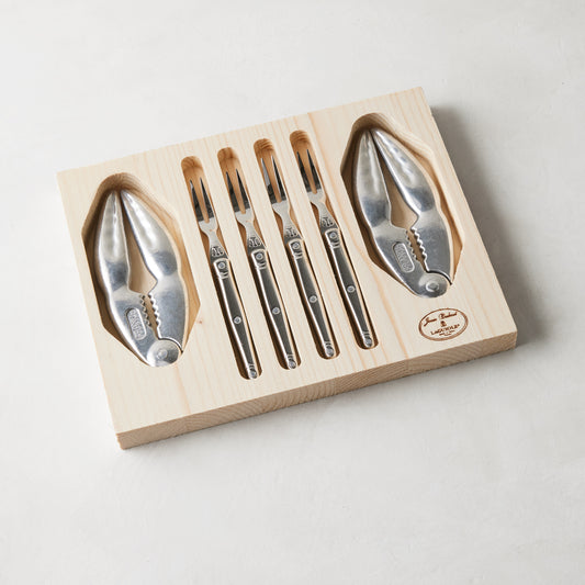 Jean Dubost Laguiole 6-piece stainless steel seafood set in a wooden box, with 4 forks and 2 crackers.
