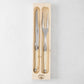 Jean Dubost Laguiole carving set: stainless steel knife and fork with ivory handles in a wooden box.