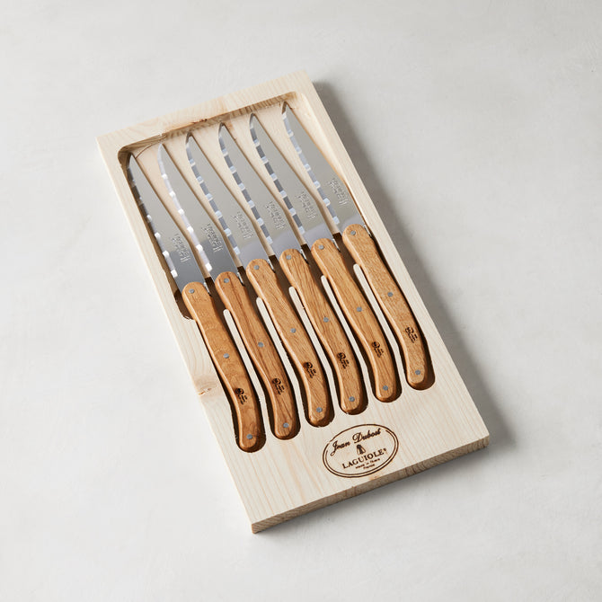 Jean Dubost Laguiole oak wood handle steak knives, set of 6, in a light wood storage box.