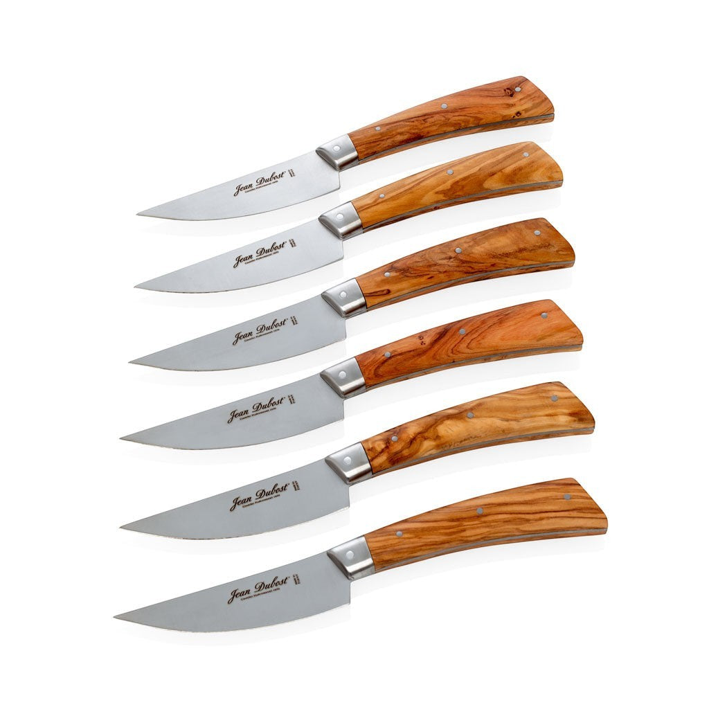 Set of 6 Jean Dubost Laguiole steak knives with olive wood handles and stainless steel blades.