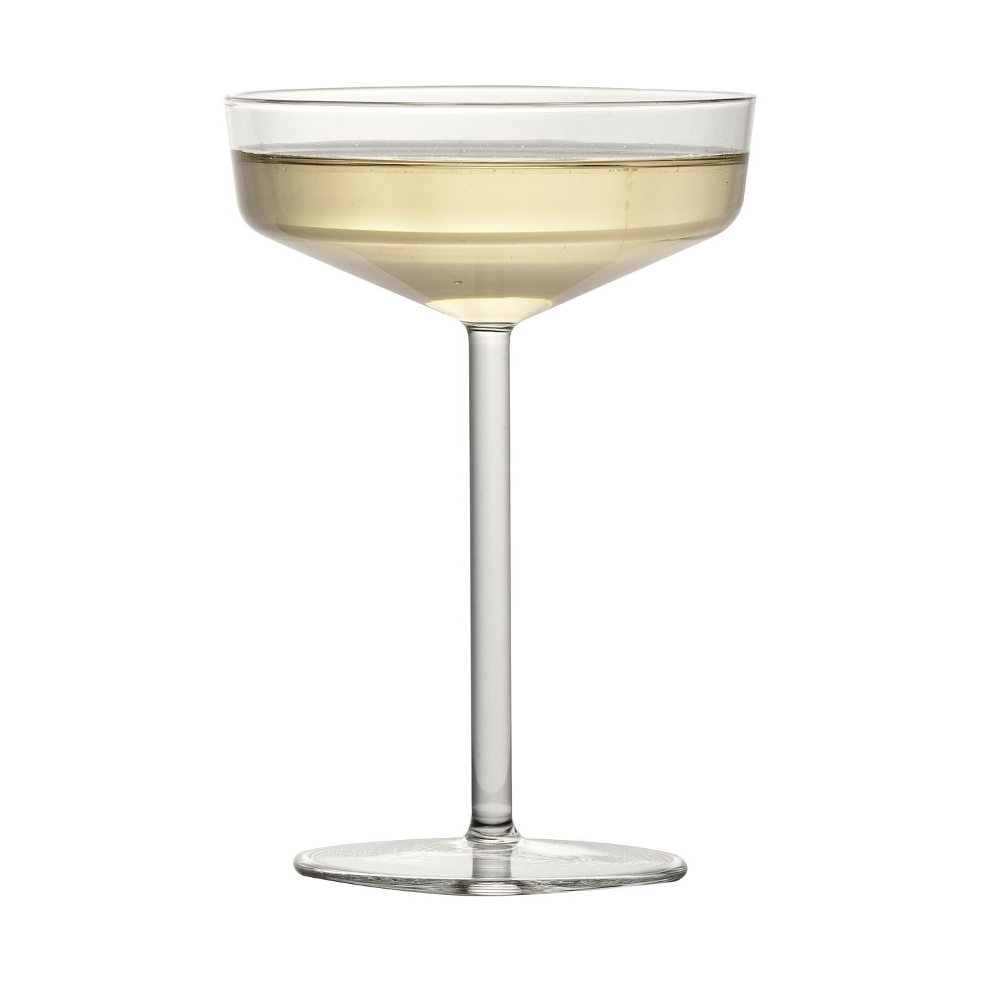 Modern clear glass coupe with a geometric bowl and thin stem, filled with a pale golden cocktail.