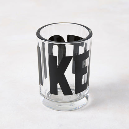 Clear glass "Keaton" Everyday Wine Glass with bold black "KEATON" signature by Diane Keaton x Hudson Grace.