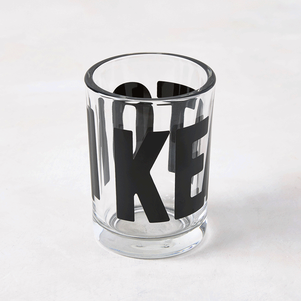 Clear glass "Keaton" Everyday Wine Glass with bold black "KEATON" signature by Diane Keaton x Hudson Grace.