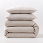 Stacked khaki European washed linen duvet and two matching pillow shams on a white background.