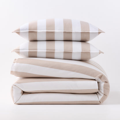 Khaki and white wide-striped duvet cover folded with two matching rectangular pillow shams stacked on top.
