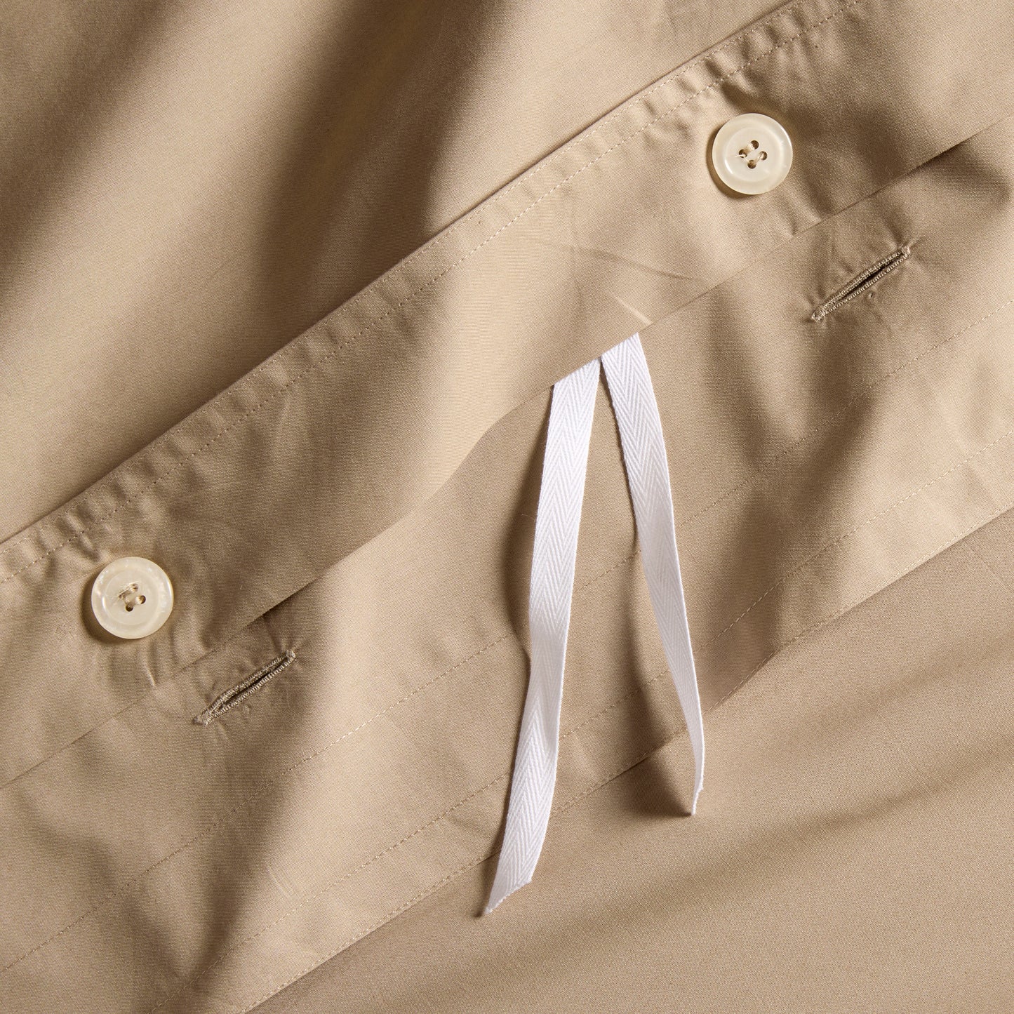 Khaki Italian Percale Duvet Set, close-up of button closure with white ties.