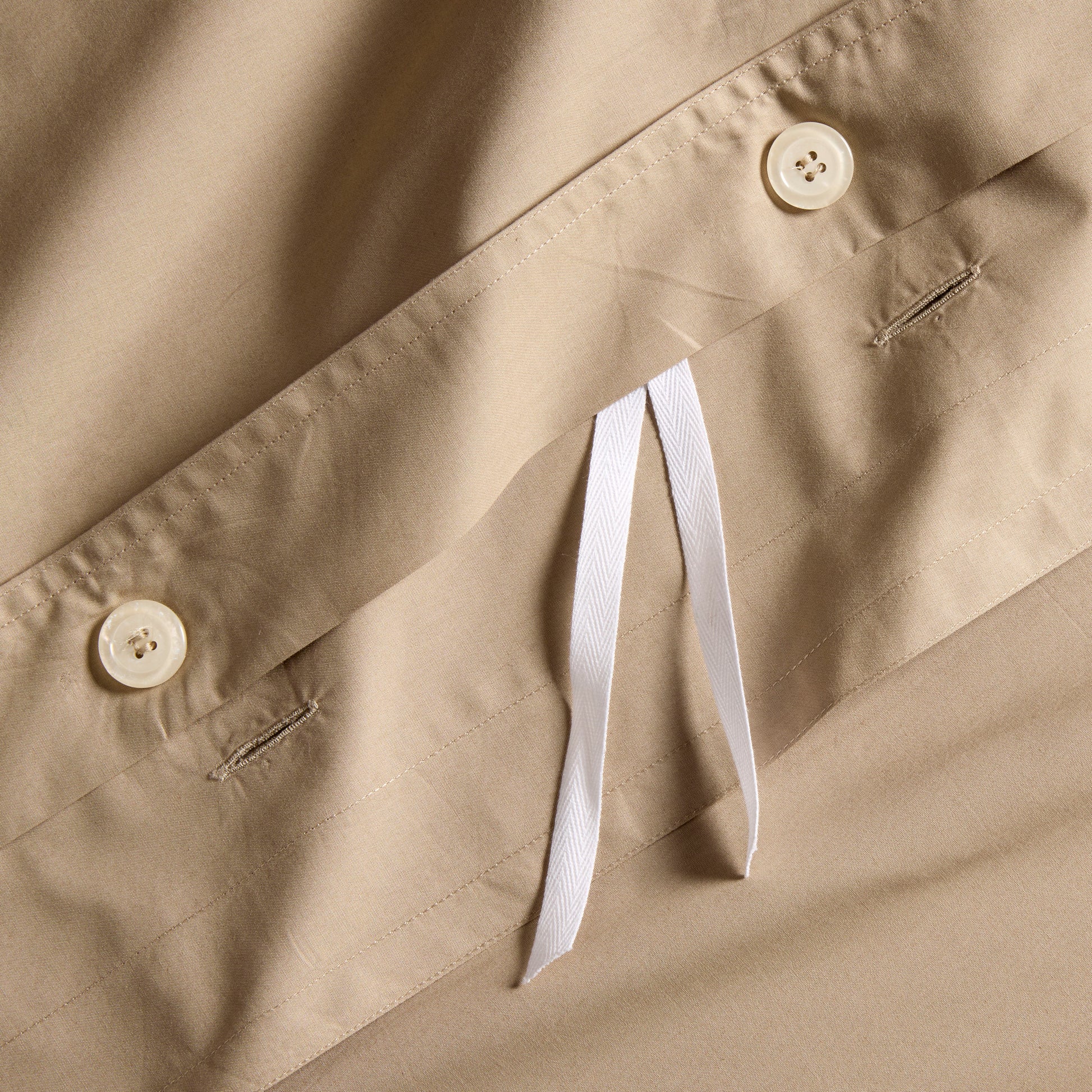 Khaki Italian Percale Duvet Set, close-up of button closure with white ties.