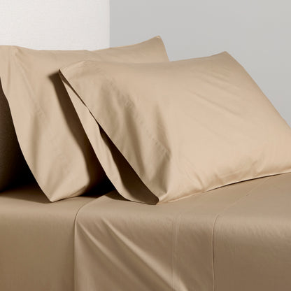 Khaki Italian Percale Sheet Set: two pillowcases and a flat sheet in a soft, smooth fabric.