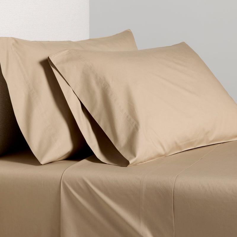 Khaki Italian Percale Sheet Set: two pillowcases and a flat sheet in a soft, smooth fabric.