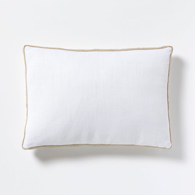 White linen lumbar pillow with khaki velvet gusseted trim.
