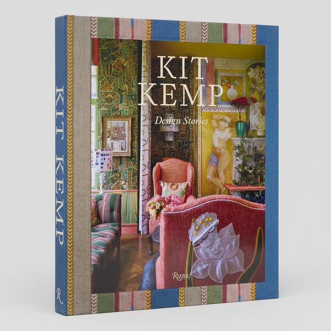 Kit Kemp: Design Stories hardcover book with colorful patterned spine and vibrant interior design cover image.