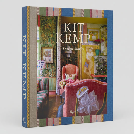 Kit Kemp: Design Stories hardcover book with colorful patterned spine and vibrant interior design cover image.