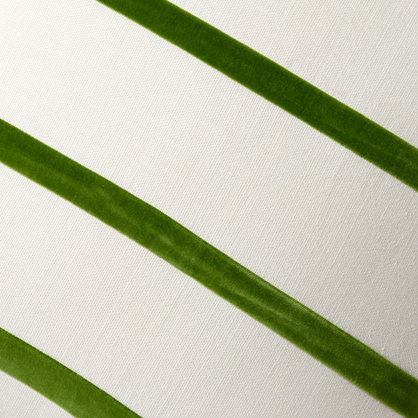 Kiwi green velvet stripes on an ivory Belgian linen pillow.