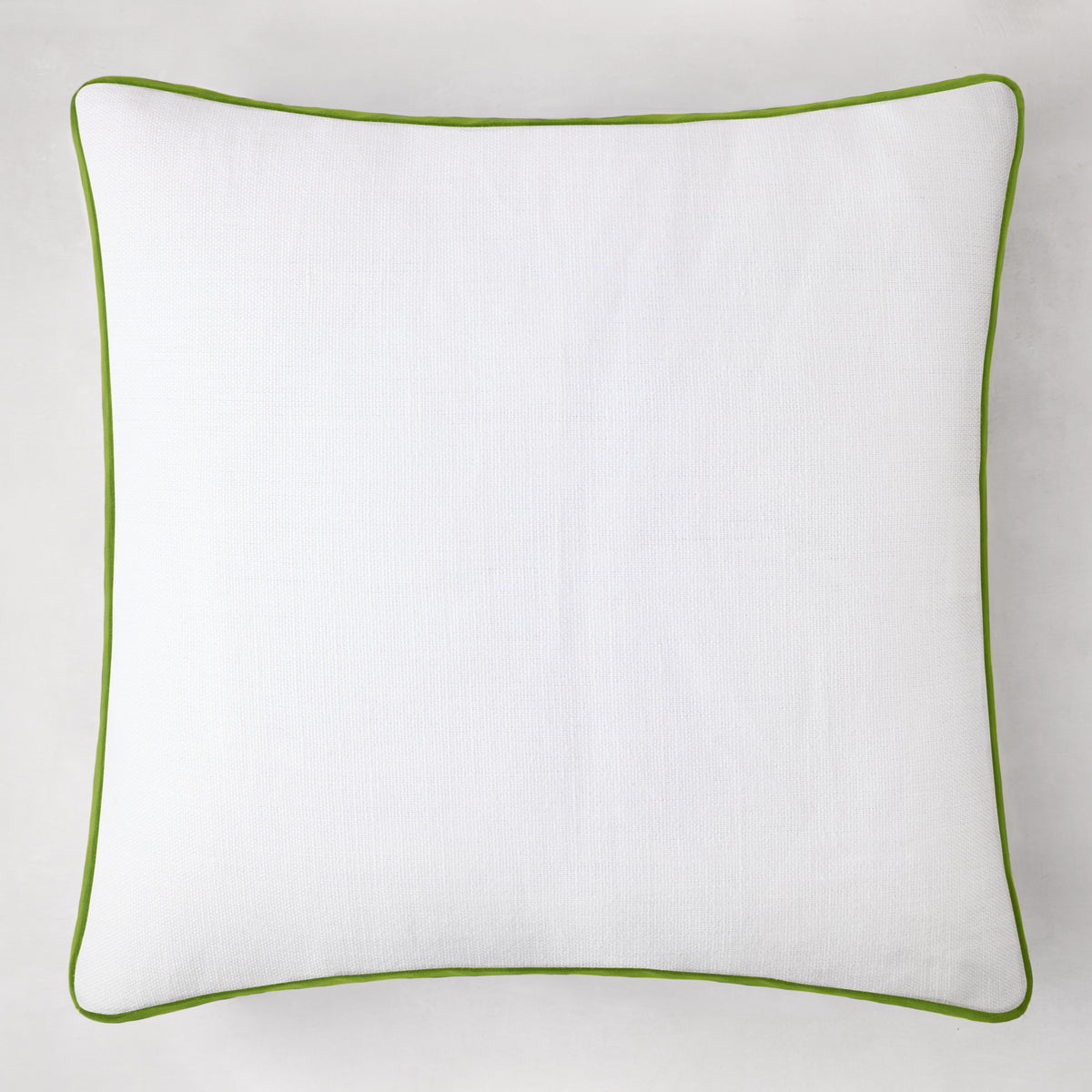 White square pillow with kiwi green velvet gusset and piping.