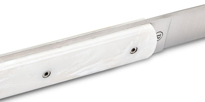 Perceval 9.47 knife with a cream-colored Krion handle and stainless steel blade featuring a flush, sleek design.