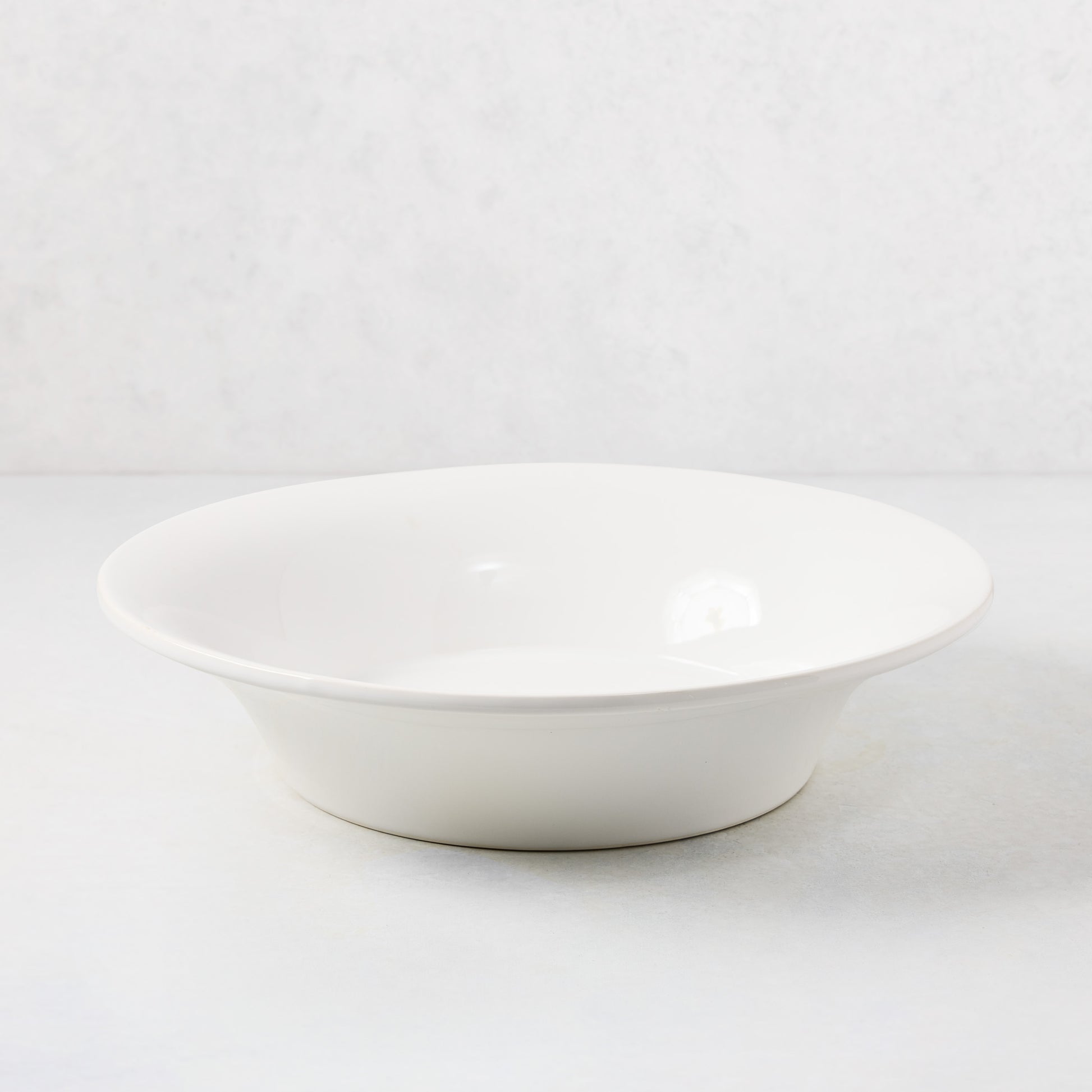 Lagos white ceramic serve bowl with a slightly flared edge, 14.6"Dia.