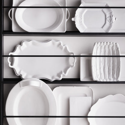 White ceramic Lagos Large Serving Platter with a slightly raised edge and signature white glaze.