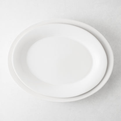 Lagos Large Ceramic Serving Platter, white glaze, oval, 18"L x 14"W, slightly raised edge.
