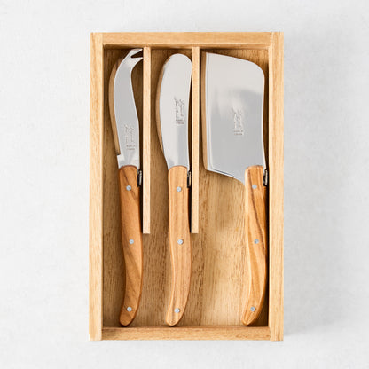 Laguiole 3-piece cheese knife set with stainless steel blades and olive wood handles in a wooden box.