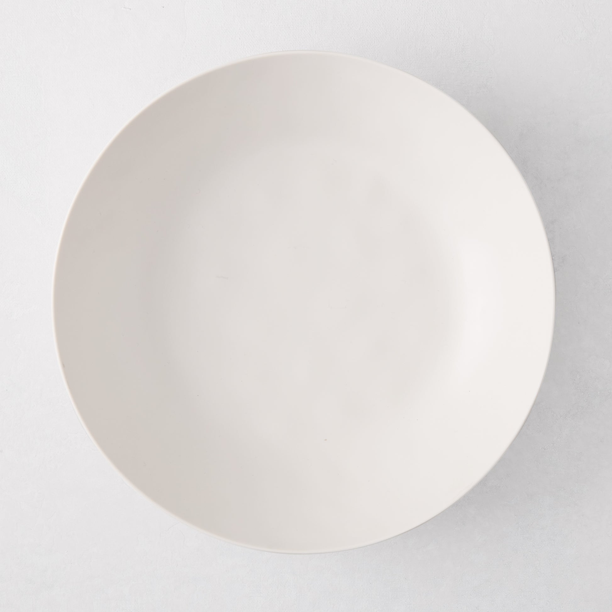 Laguna Melamine Low Bowl, off-white, 9" diameter, casual style.