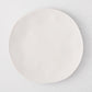 Laguna Melamine Appetizer Plate, off-white, 6.8"Dia, round, with subtle wavy edge.
