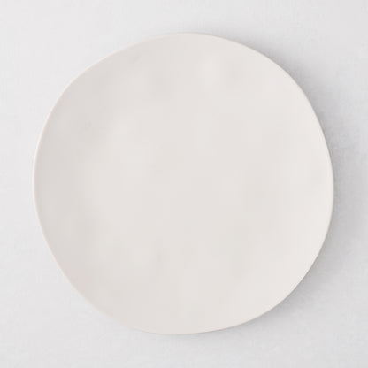 Laguna Melamine Appetizer Plate, off-white, 6.8"Dia, round, with subtle wavy edge.