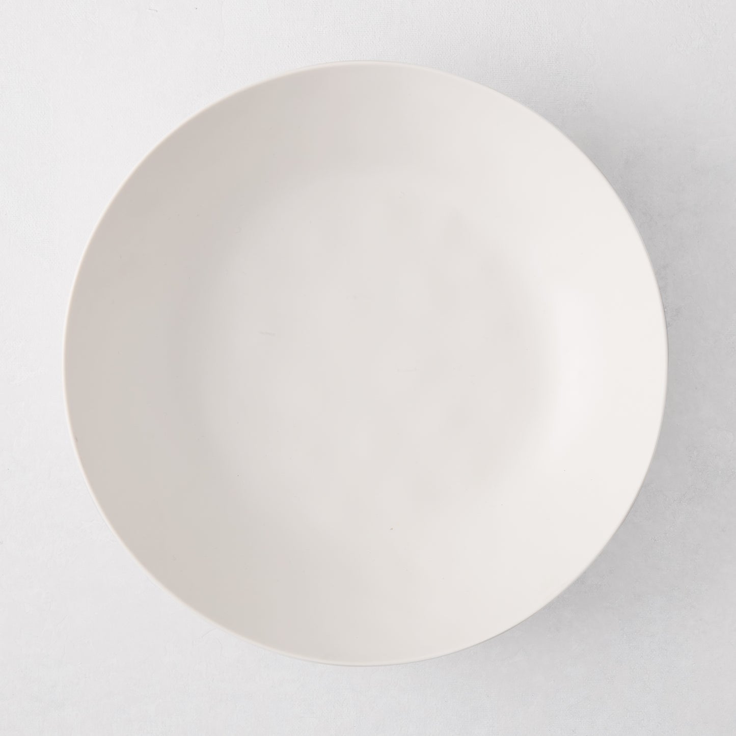 Laguna Melamine Low Bowl, off-white, 9" diameter, casual style.