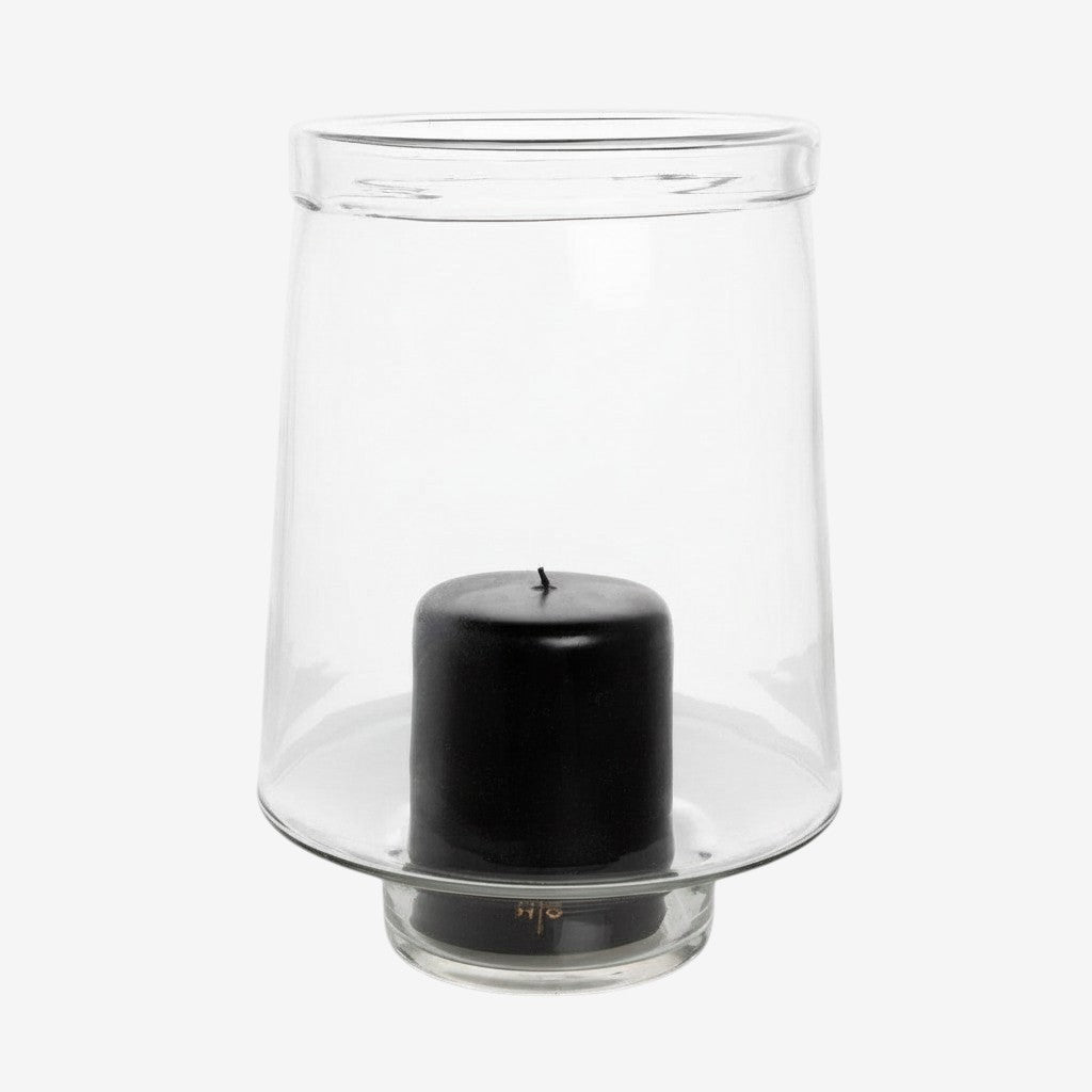 Hudson Grace large clear glass Antwerp hurricane candle holder with a black pillar candle and folded edge detail.