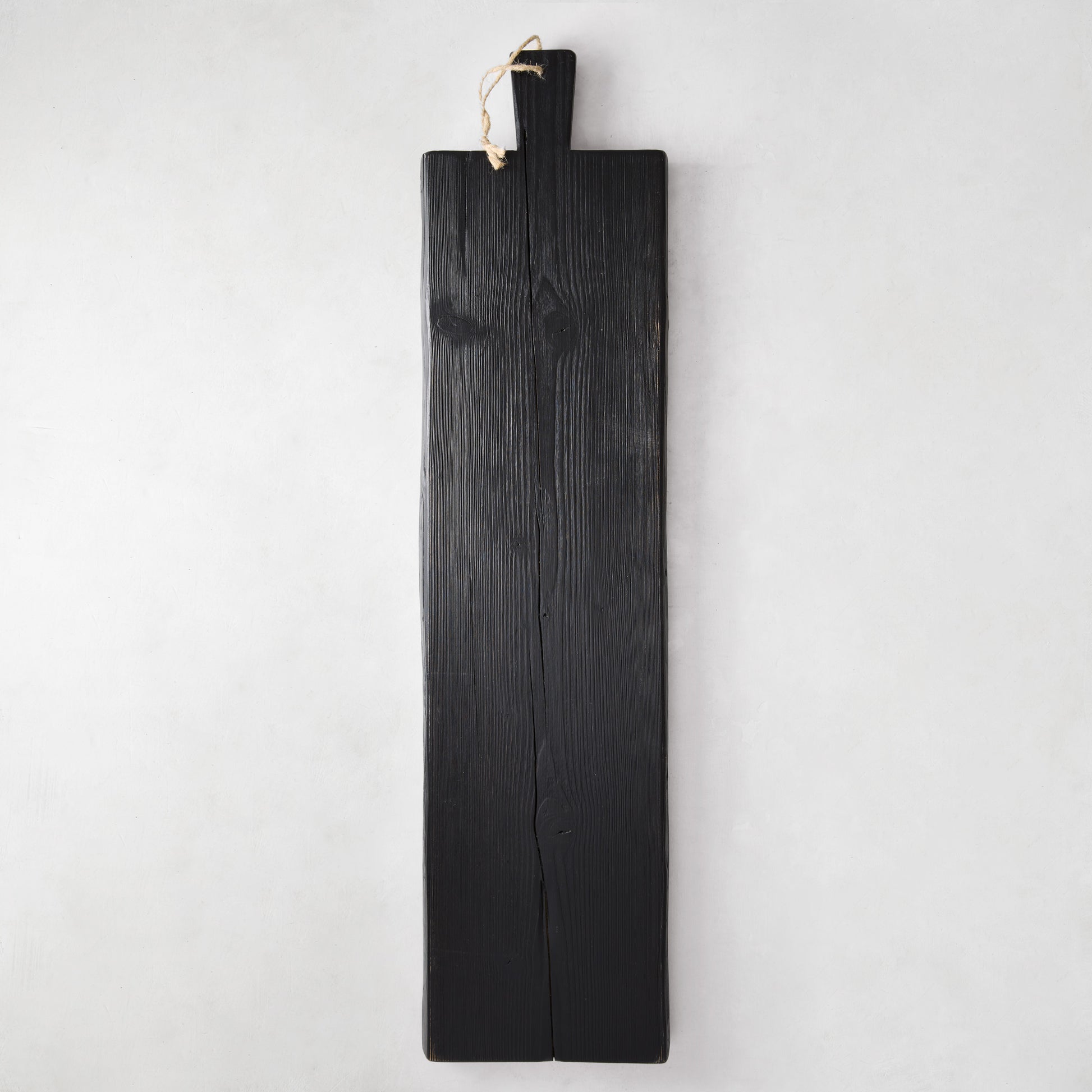 Large black reclaimed wood serving plank with handle and tag, 40"L x 10"W.