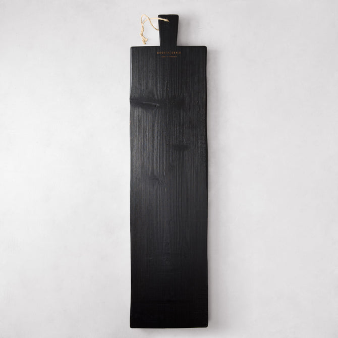 Long black reclaimed wood serving plank with handle and rope, 40"L x 10"W.
