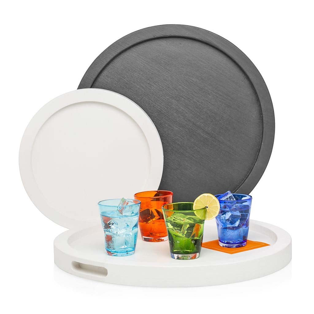 Large black and small white round wood serving trays with colorful drinks.