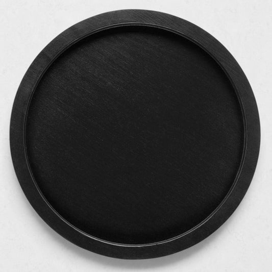 Large round black reclaimed pine wood serving tray with raised rim.