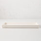 White ceramic HG Large Everyday Tray, 11"L x 5"W, with understated lip and HG monogram.