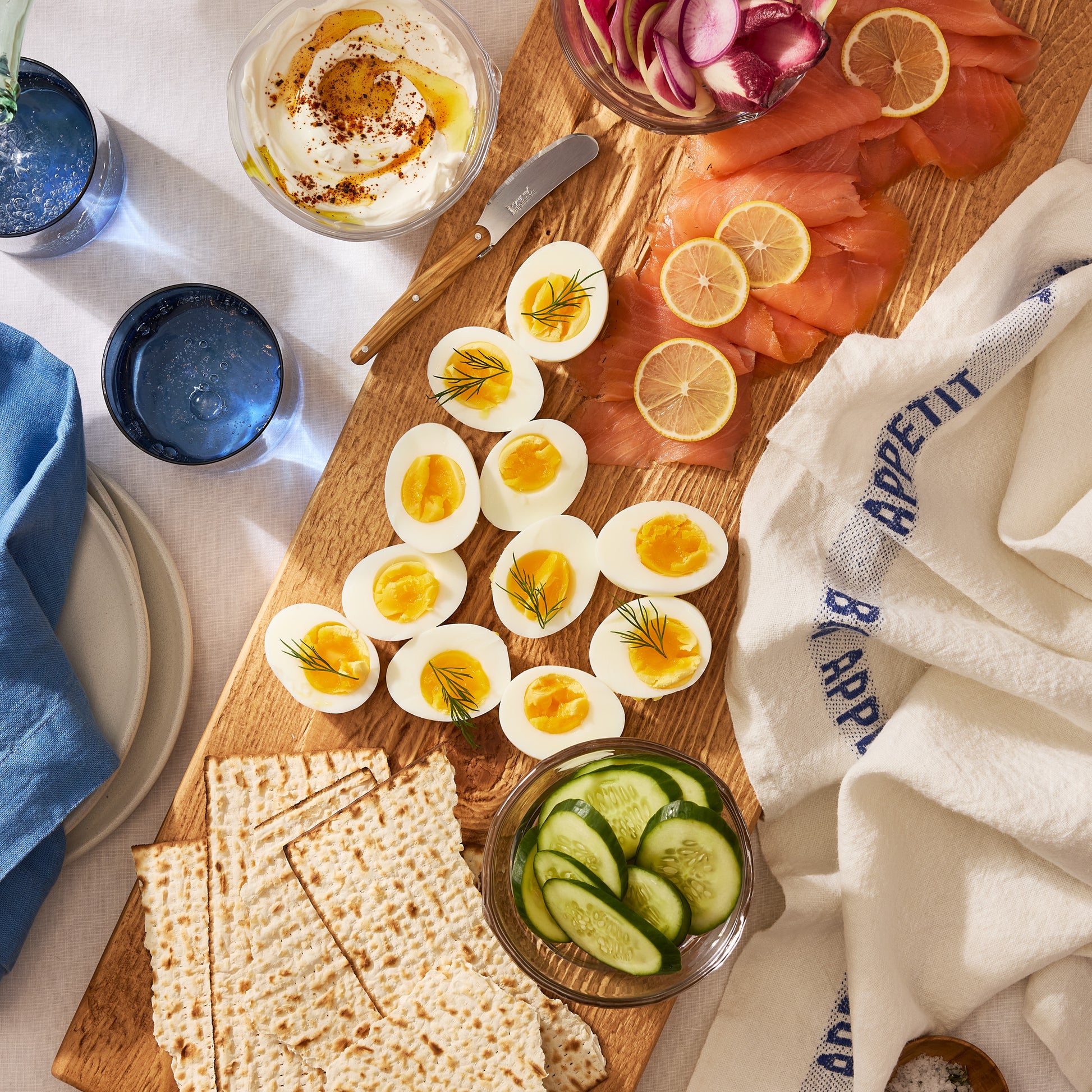 Large Farmtable Wood Serving Plank, natural European pine, with charcuterie, eggs, and matzo.