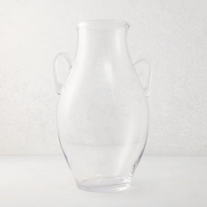 Large clear recycled glass confit vase with organic curves and decorative handles.