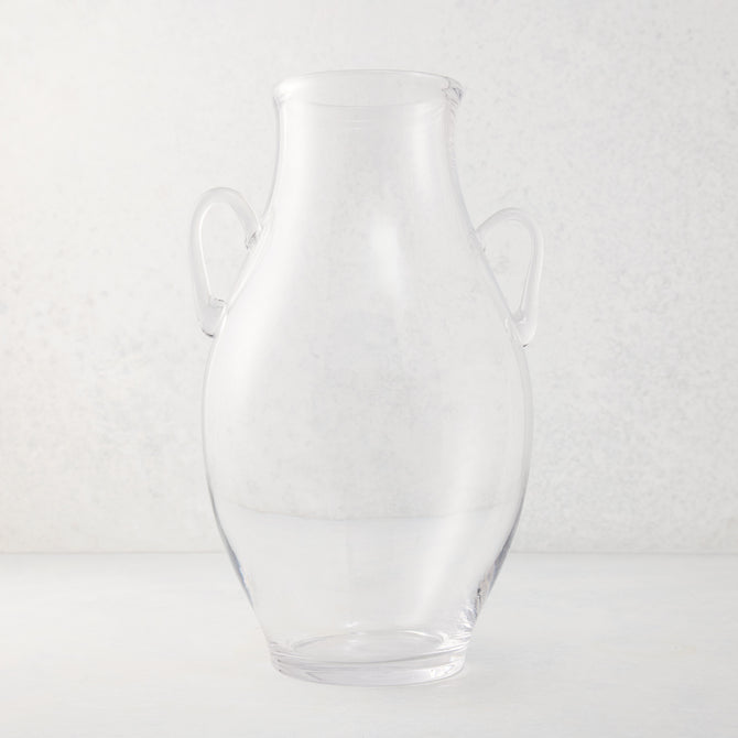 Large clear recycled glass confit vase with organic curves and decorative handles.