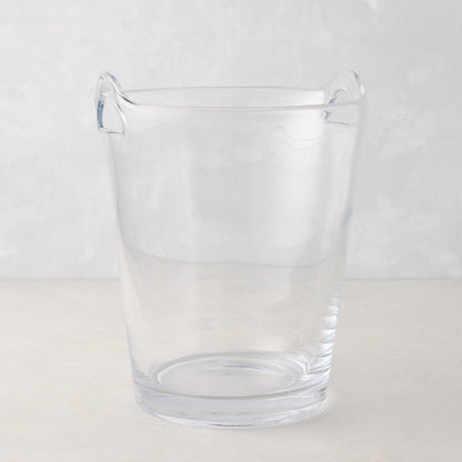Large clear handblown glass ice bucket with two handles.