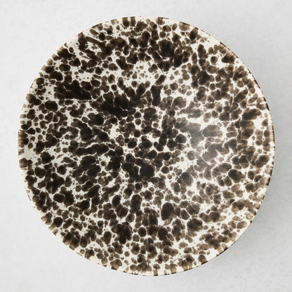 Large Nuno Splatter stoneware serve bowl with brown spots on a pale cream base.