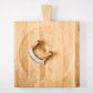 Large reclaimed oak wood cutting board bowl with a mezzaluna blade.