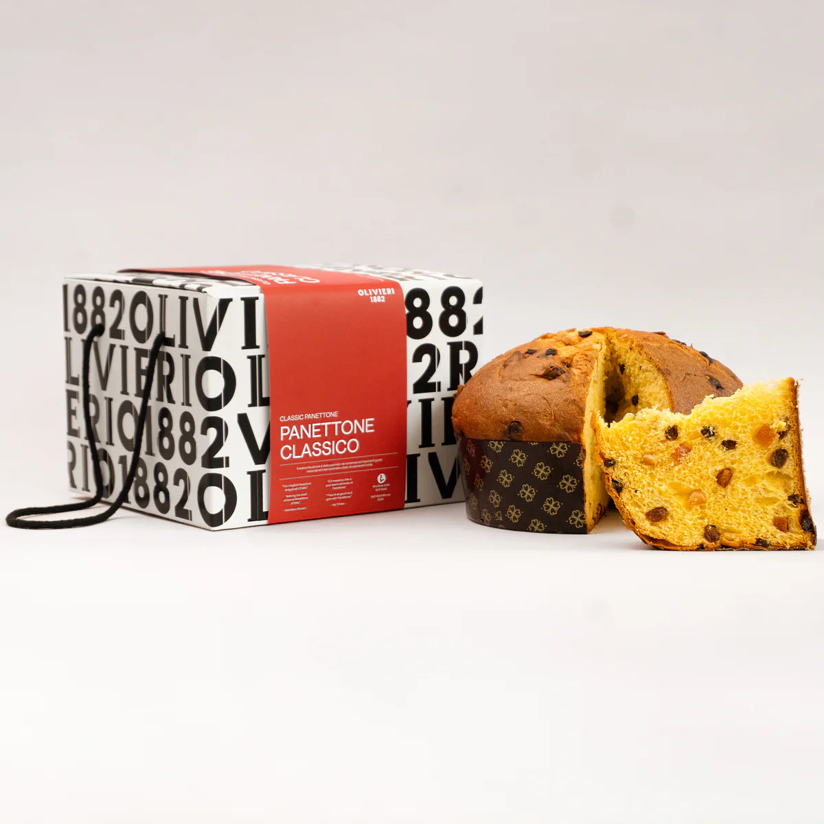 Olivieri Classic Panettone with raisins and candied orange, next to a branded white and black box with a red label.