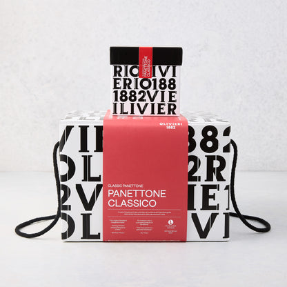 Large Olivieri Classic Panettone in a white box with black typography and a bold red center band with black rope handles.