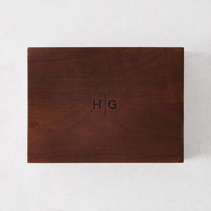 Large rectangular matchbox made of dark walnut wood with an engraved HG monogram on the lid.