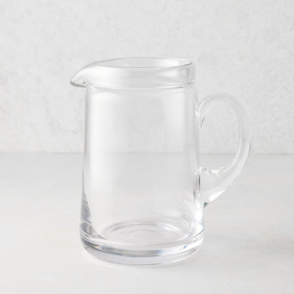 Large Oxford clear glass pitcher with hand-molded rim and handle.