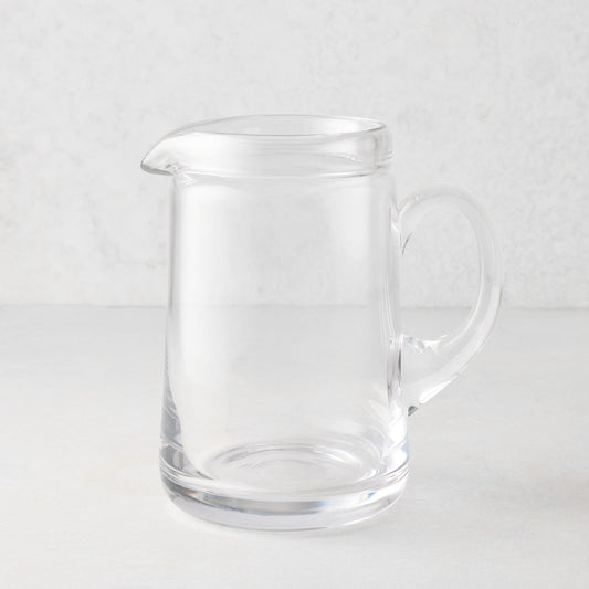 Large Oxford clear glass pitcher with hand-molded rim and handle.