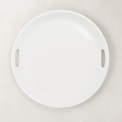 Creamy white ceramic round serving tray with integrated handles, 16.5" diameter.