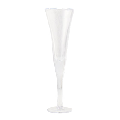 Clear, tall glass champagne flute with a unique rippled, scissor-cut rim and thick base.
